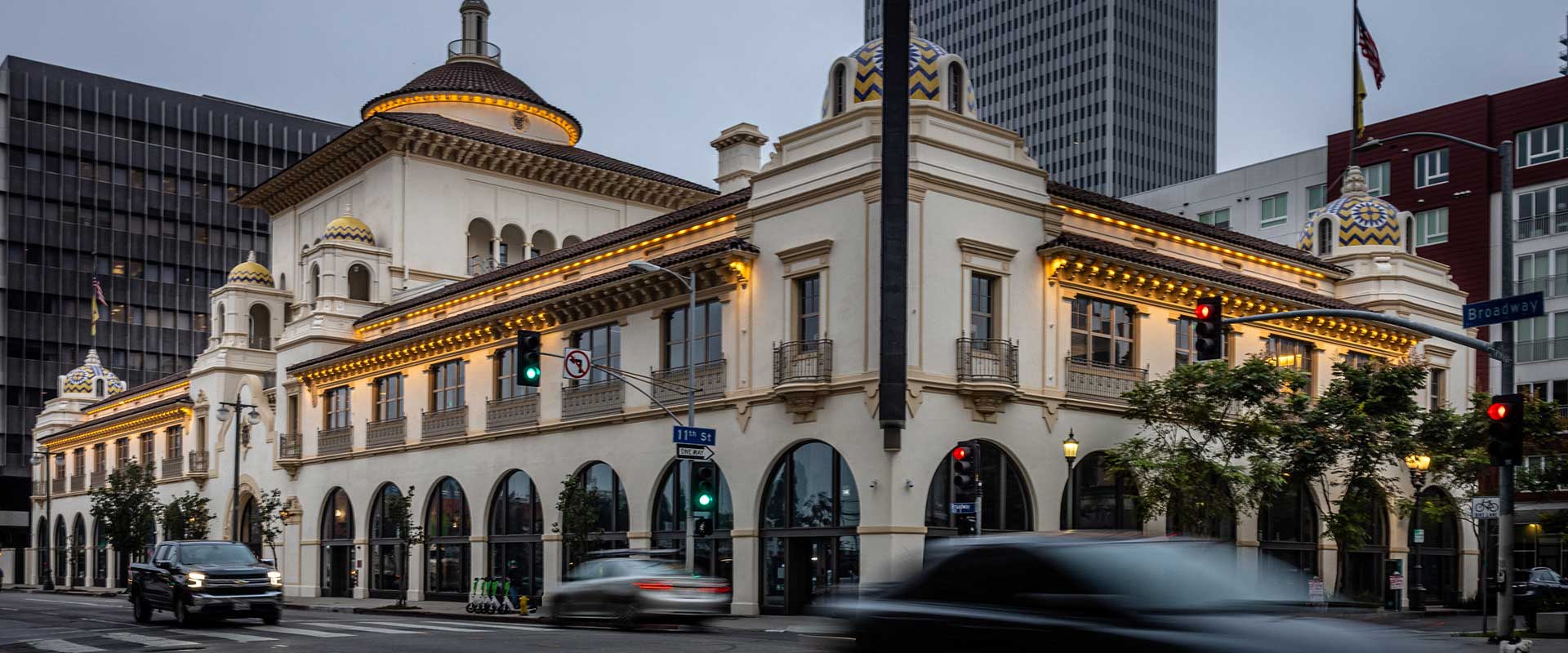 A building with lights on the side Description automatically generated